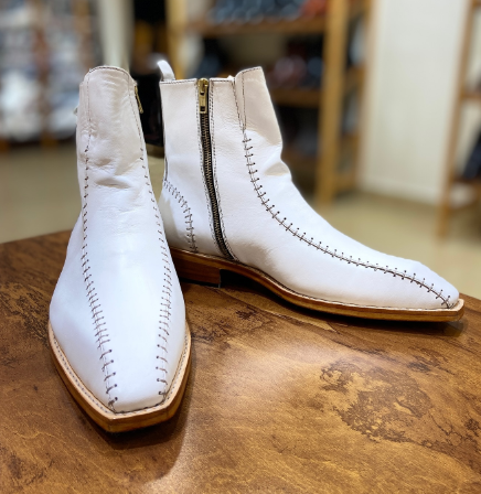 Exquisite Handcrafted White Leather Boots with Intricate Stitching